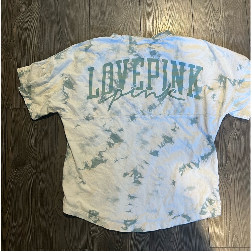 Pink by VS T-shirt. Size medium. Color is tie dye green, cream, and yellow